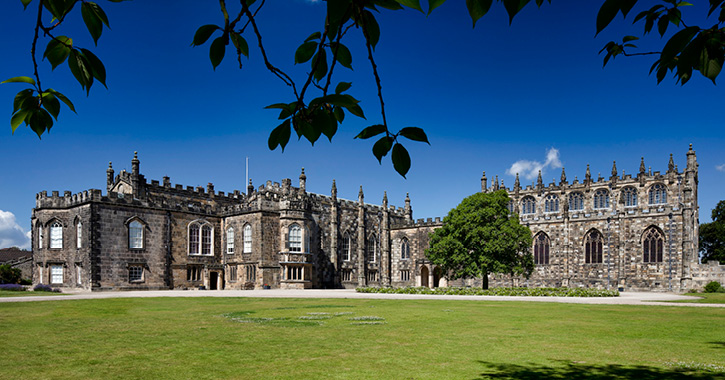 View of Auckland Castle, Bishop Auckland surrounded by blue sky